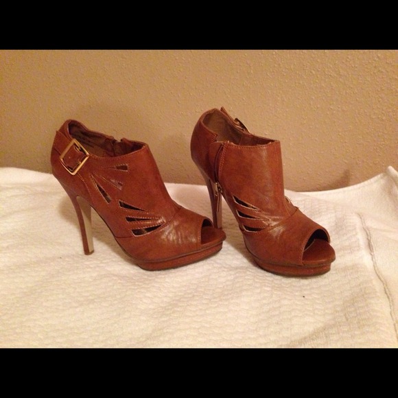 Brown cutout booties with gold