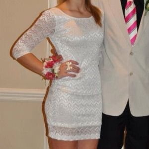White dress with lace arms and medium cut back