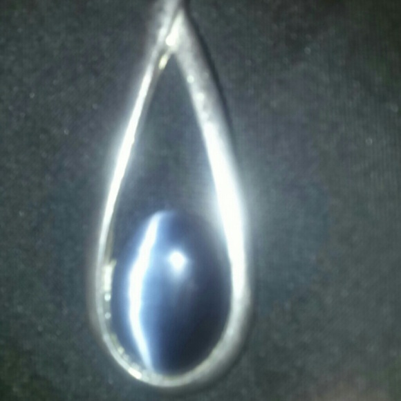 Jewelry - Beautiful bark blue charmed necklace.