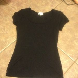 Tight black nylon scoop neck top