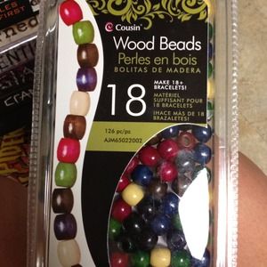 NEVER BEEN OPEN. Wooden beads for jewelry.