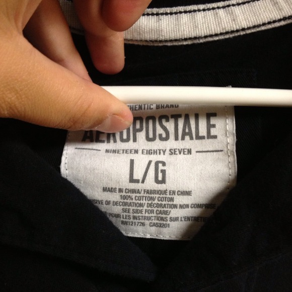 BNWOT Men's black aero polo. - Picture 1 of 2