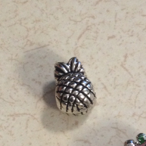 Pandora style charm pineapple.