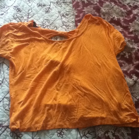 Teal and orange open back shirts