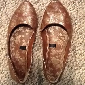 brown flats with gold flowers