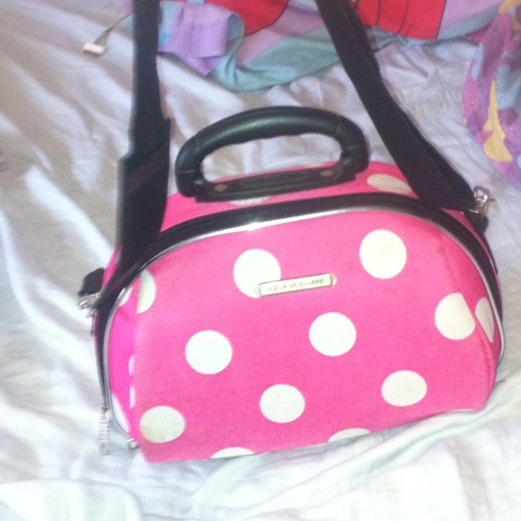 Pink and white poka dot travel bag
