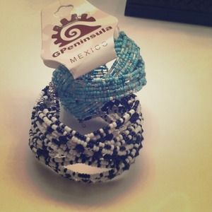 Hand beaded bracelets! Black and white & sky blue!