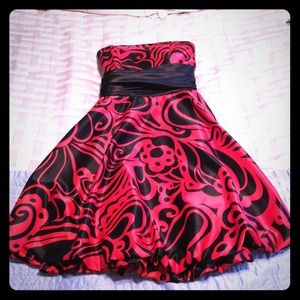 Short, strapless, red and black cocktail dress.