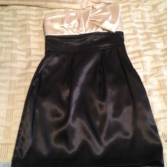 Short, black and gold cocktail dress.