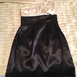 Short, black and gold cocktail dress.