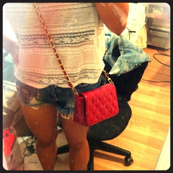 Red quilted cross body bag