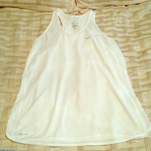 White Nike Dri-Fit exercise top.
