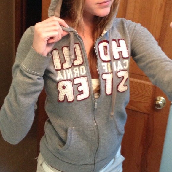 Hollister grey zip up hoodie, red & white writing