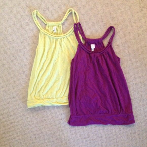 purple and yellow razorback tanks
