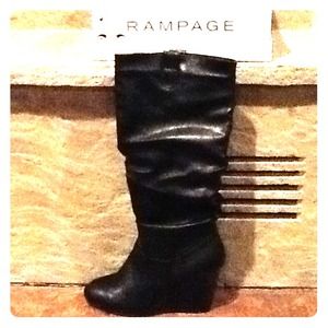 Never worn wedge boots. Size 8.