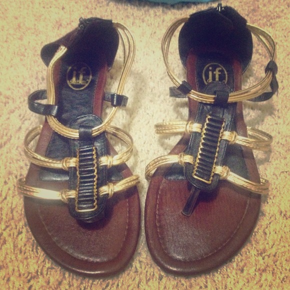 Black and gold gladiator sandals. Worn twice.