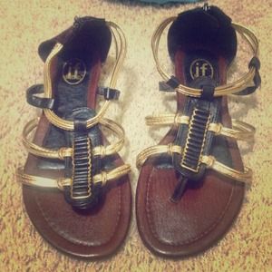Black and gold gladiator sandals. Worn twice.