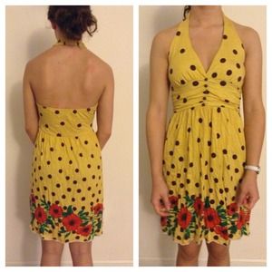 l yellow dress. Brown dots. Red flowers