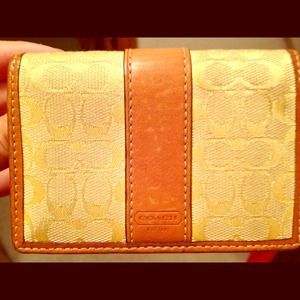 Cute yellow coach wallet!