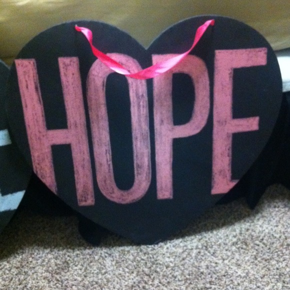 3 black foam Victoria Secret heart shaped signs.