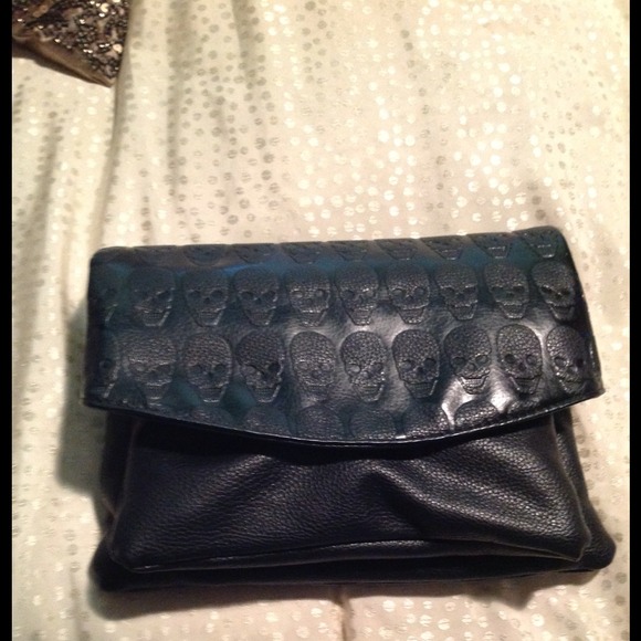 Skull embossed clutch