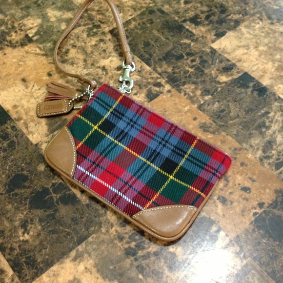Beautiful plaid Coach wristlet. Never used.