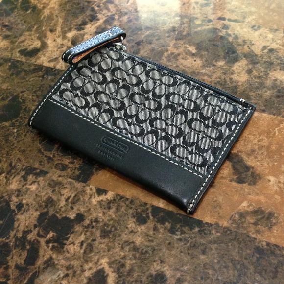 Coach mini skinny. Black signature fabric.