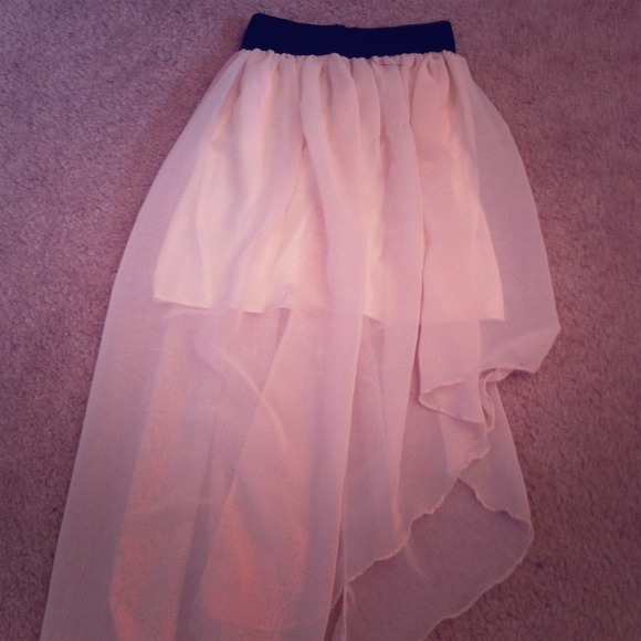 Cream high low skirt.