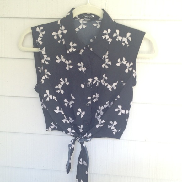 Sleeveless button down tie bottom bow top