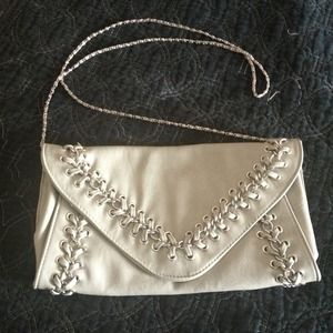 Grey Leather clutch with chain strap option.