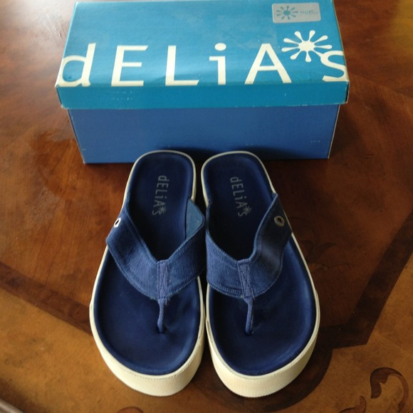 Blue Delia's flip flops