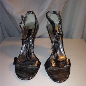 Nina silver ankle wrap heels.