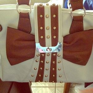 Tan, Creme and white color, never worn