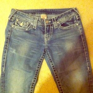 True Religion pale wash jeans.