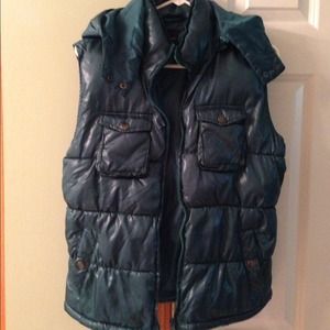 Puffy dark green winter vest