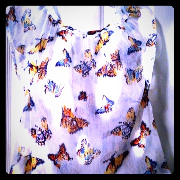 Really cute sheer too with butterfly design.