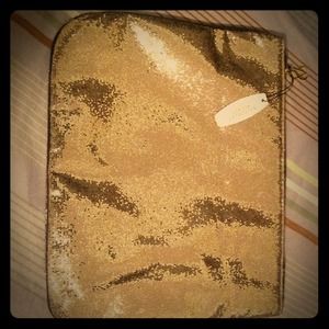 A very authentic golden Victoria secret purse