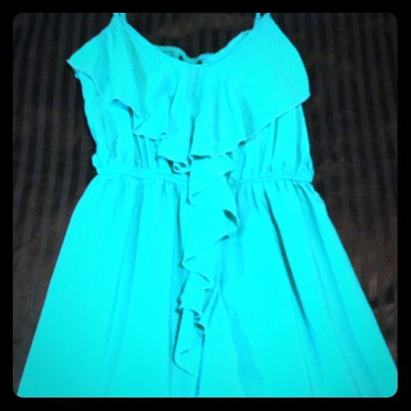 Teal/green dress.