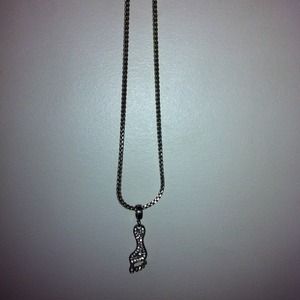 A long foot necklace with jewels very unique .