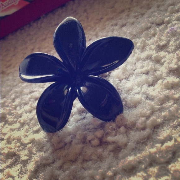 Black plumeria flower clip on to hair