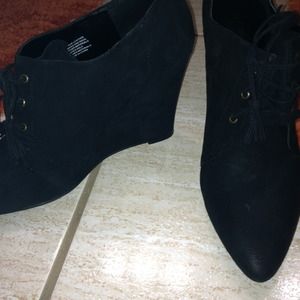 Black wedge heeled ankle boots