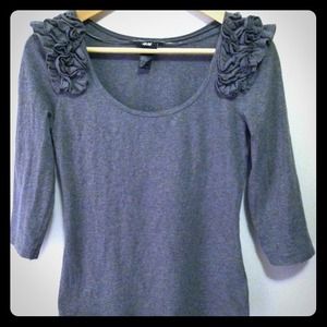 Gray cotton top with ruffle floral embellishments