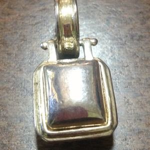 Reversible gold/silver pendant