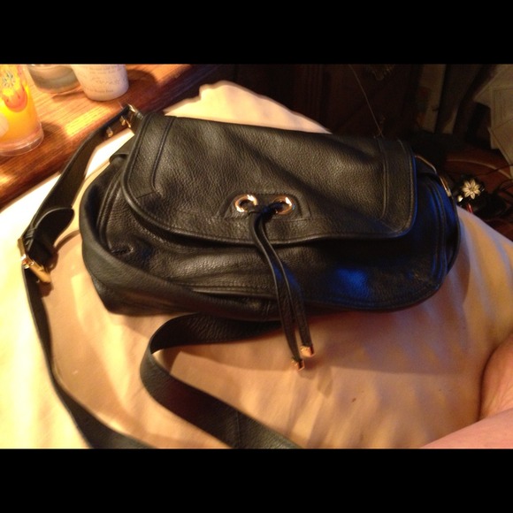 Leather cross body- bought June 28 for a trip.