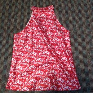 Flirty and fun sleeveless top!