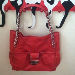 B. Makowsky red leather bag with chain strap