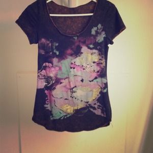 Brown colorful short sleeved shirt.