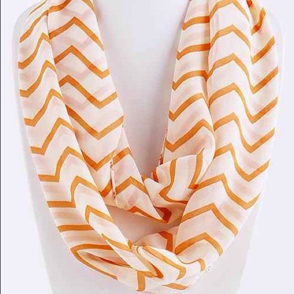 Orange chevron scarf.