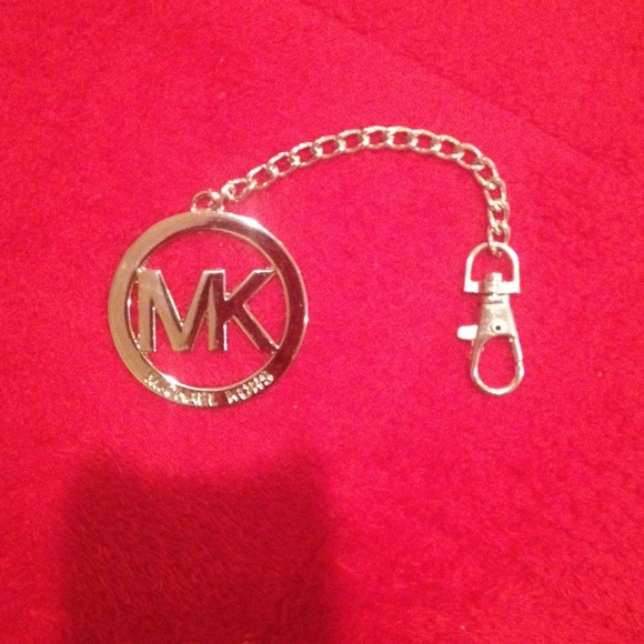 Micheal kors silver key chain new make a offer !!