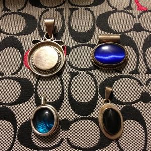 Lot of .925 sterling silver pendants.
